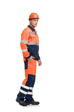 Çalışan giysi ve kask profil görünümünde adam
