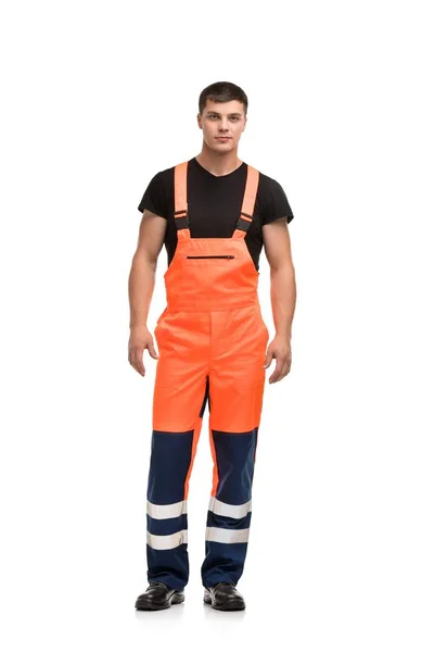 Man in werkende overalls geïsoleerd uitzicht — Stockfoto