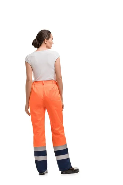 Slim Girl i arbetskläder isolerad back — Stockfoto