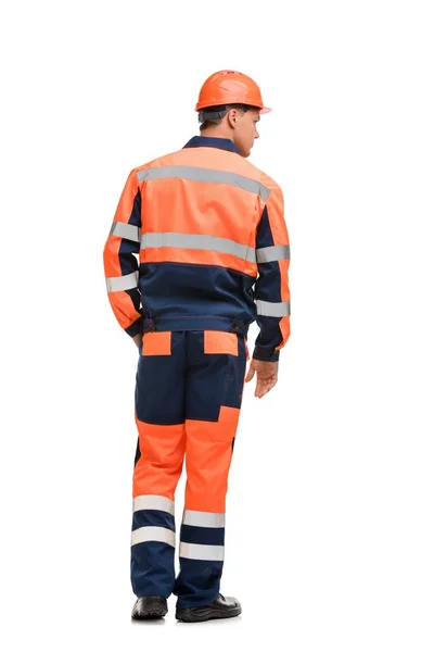 Man in werkende kleren en helm geïsoleerd uitzicht — Stockfoto