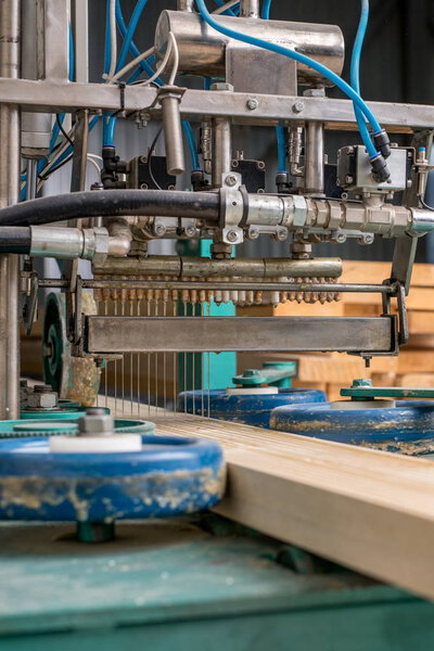 Woodworking. Image of apply the adhesive on timber