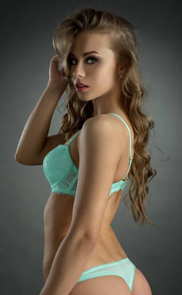 Beautiful underwear model posing looking at camera — Stock Photo, Image