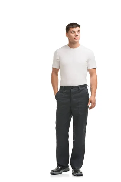 Homem bonito em calças de trabalho cinza vista — Fotografia de Stock