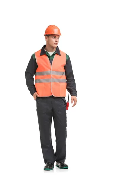 Muž v černém pracovním oblečení a zobrazení helmy — Stock fotografie