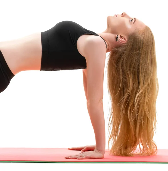 Schlanke Blondine beim Handstand im Studio erschossen — Stockfoto