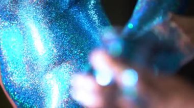 Glitter bodyart on woman body backstage shot