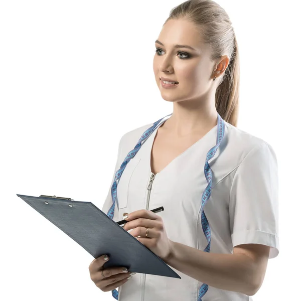Nutritionist in white uniform with pen and folder — Stock Photo, Image