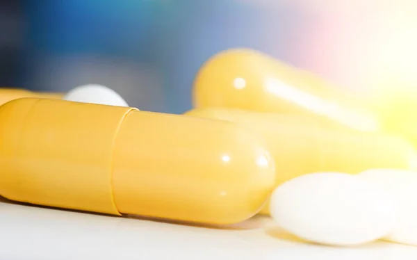 Yellow and white  pills — Stock Photo, Image