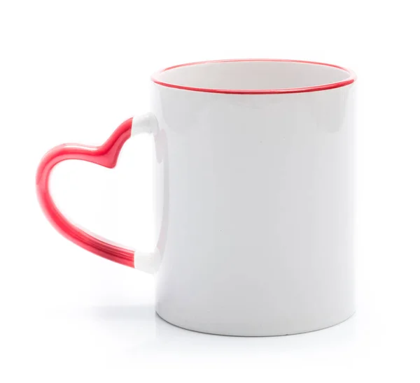 Біла чашка з червоною ручкою у формі серця — стокове фото