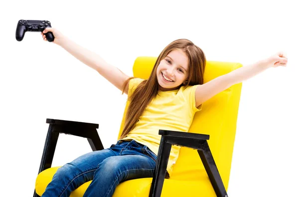 Girl holding up console, winning a game — Stock Photo, Image