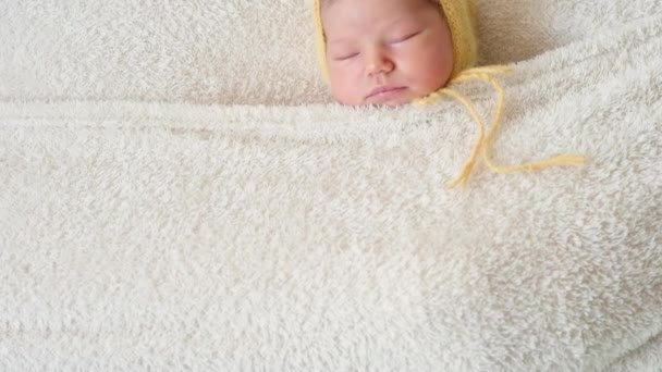 Adorable sleeping baby covered by blanket — Stock Video