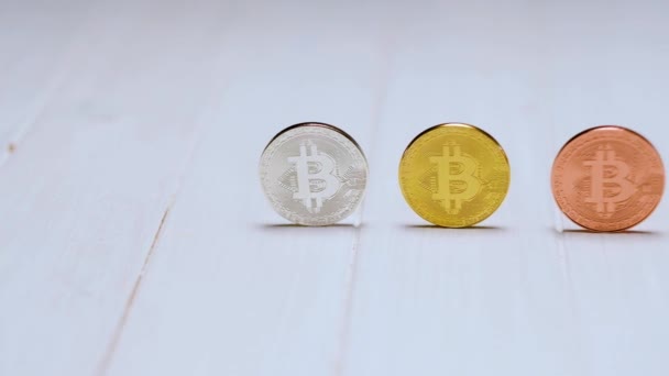Bitcoins on white table — Stock Video