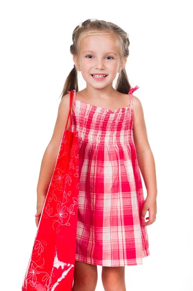 Entzückendes kleines Mädchen mit Einkaufstasche — Stockfoto