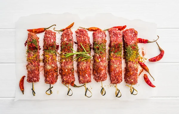 Raw kebab with spices — Stock Photo, Image