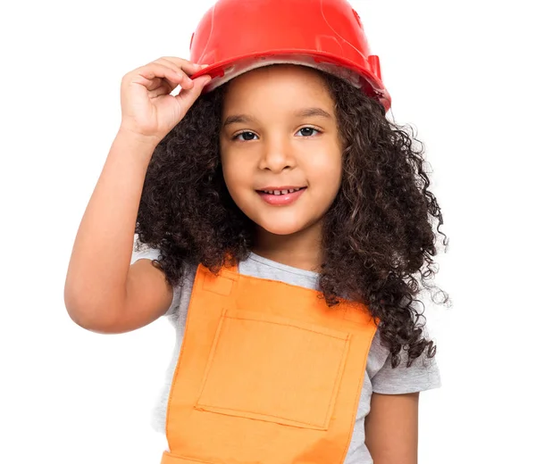 Klein meisje in oranje reparateurs uniforme geïsoleerd — Stockfoto