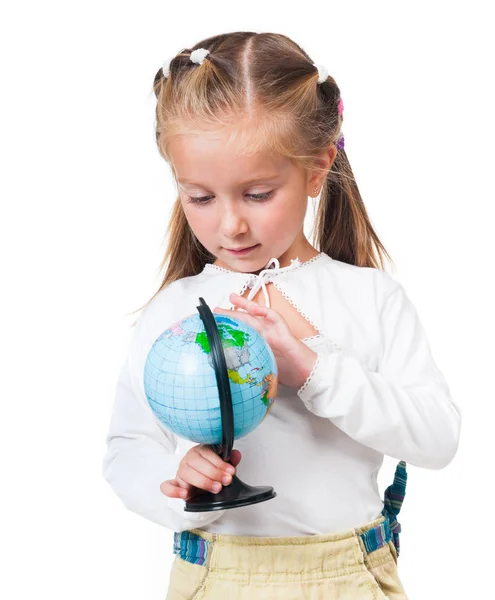 Söt liten flicka med globe — Stockfoto