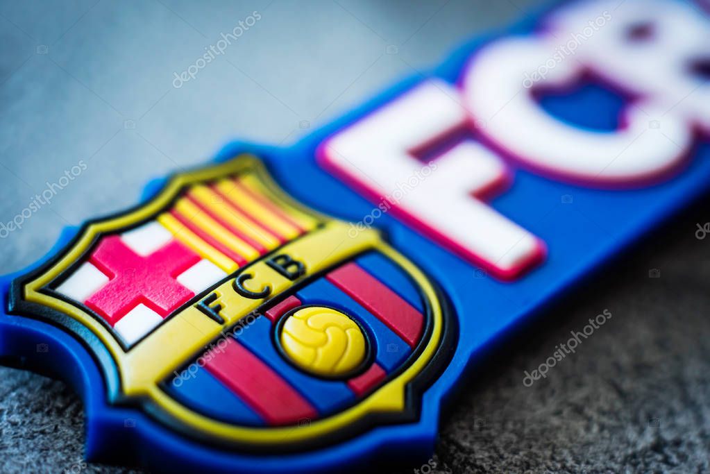 Khakiv, Ukraine - 02 May 2018: Logo of Football Club Barcelona close-up. Emblem of FC Barcelona on souvenir or magnet. Fan accessories
