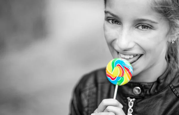 Little girl with candy — Stock Photo, Image