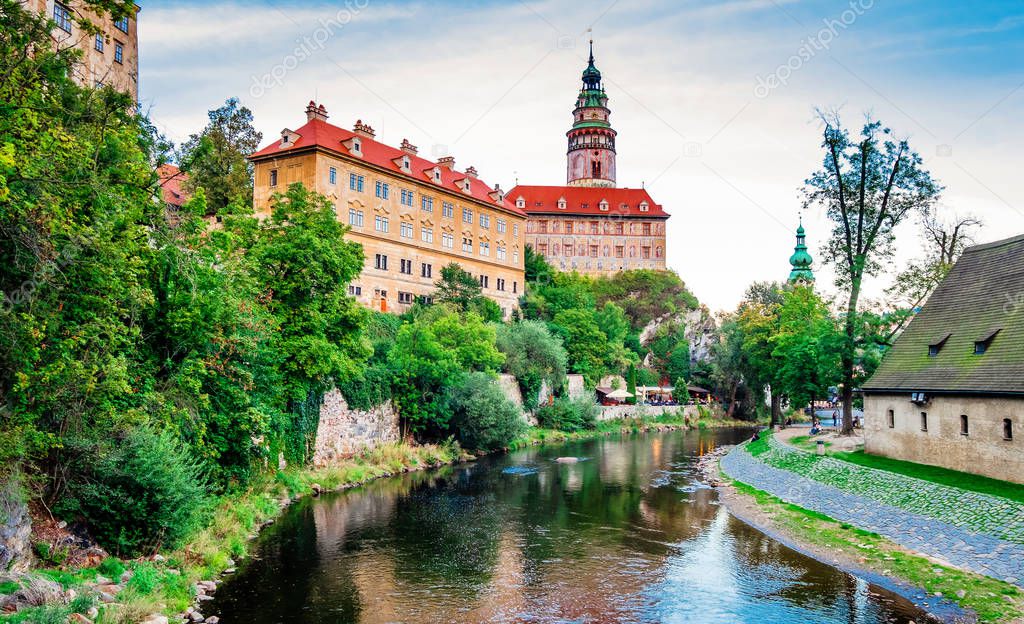 Old architecture and trees near river bay of Cesky Krumlov