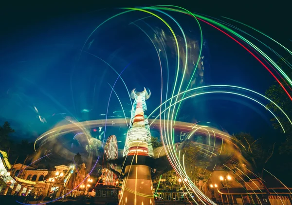 Abstract light trails of carousels — Stock Photo, Image