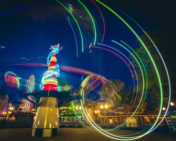 Abstracte licht paden van carrousels — Stockfoto