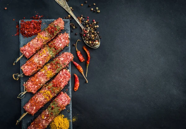 Raw kebab with spices — Stock Photo, Image