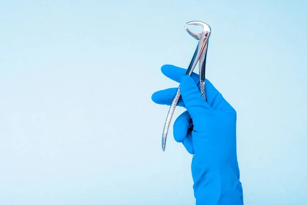 Hand holding dental flatterns — Stock Photo, Image