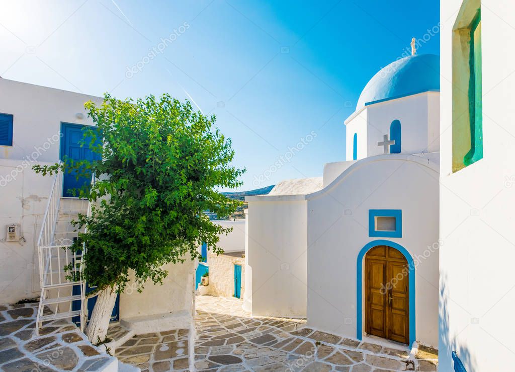 Typical church with blue dome in Lefkes