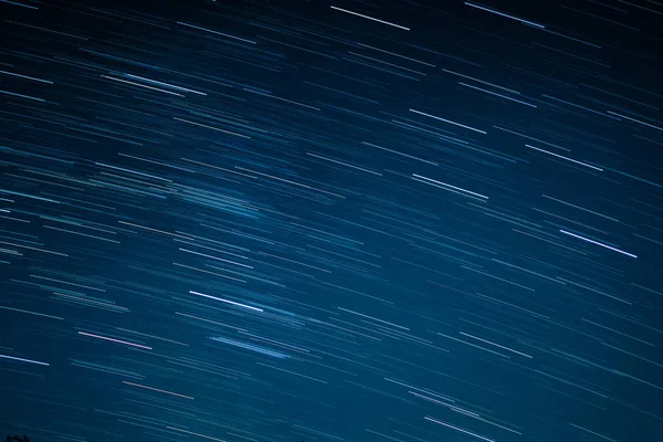 Startrails on a dark blue sky — Stock Photo, Image