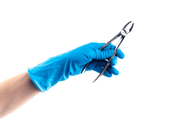 Handen in blauwe handschoenen met tandheelkundige flatterns geïsoleerd — Stockfoto