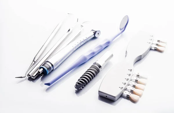 Dental tools on white table — Stock Photo, Image
