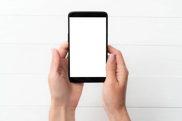 Mockup smartphone nero in mano per il tuo design — Foto Stock
