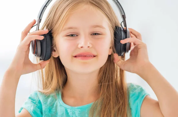 Portrait of school girl with headphones — Stock Photo, Image