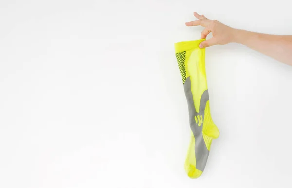 Smradlavá žlutá běžecká sportovní ponožka — Stock fotografie