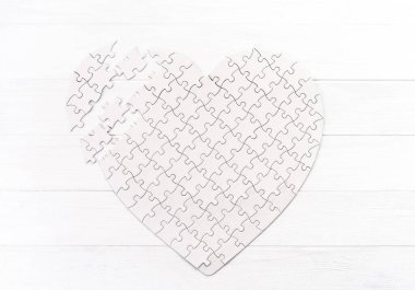 Puzzle in form of heart clipart