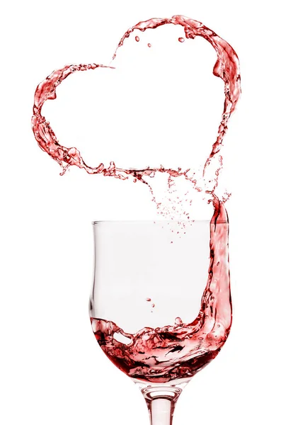 Wine splashes forming heart — Stock Photo, Image