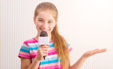 Female blogger with microphone clipart