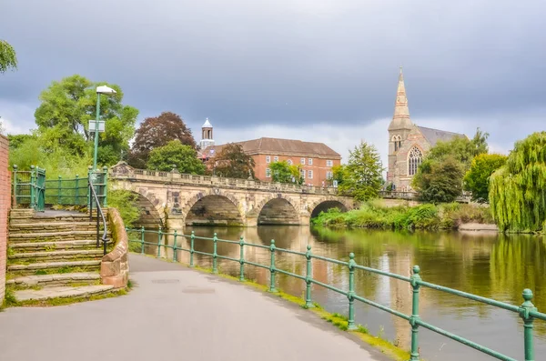 Shrewsbury town river scene with bridge and church Royalty Free Stock Photos