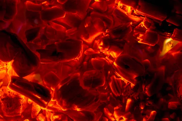 Carvão brilhante close-up peças textura de fundo quente — Fotografia de Stock