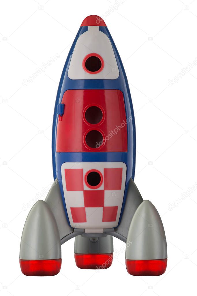 Childs plastic rocket spaceship isolated on white background