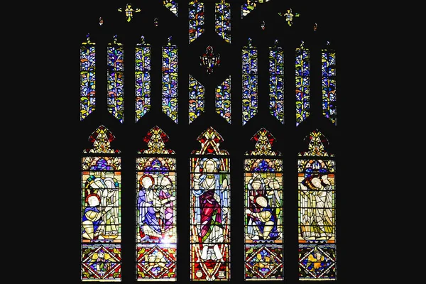 Colorful glass window with art designs in a church — Stock Photo, Image