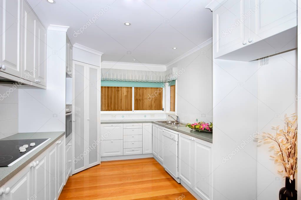Empty white kitchen