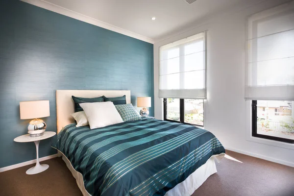 Close up of a blue decorative bedroom with white walls — Stock Photo, Image