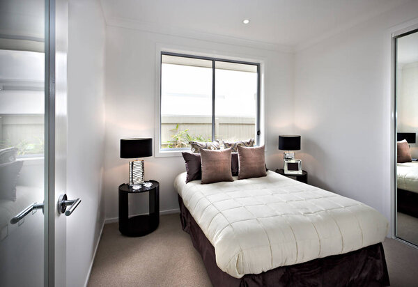 Modern and classic bedroom with windows and lamps 