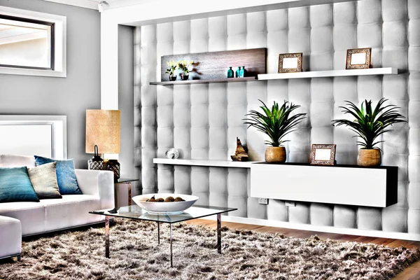 Modern living room with the carpet and glass table