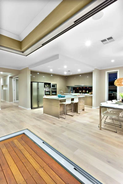 Inside of a house focusing kitchen interior lighting at night — Stock Photo, Image