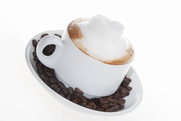 Vista laterale di una tazza di caffè bianco — Foto Stock