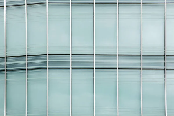 Modern glass wall office building. A glass curtain wall of a modern office building