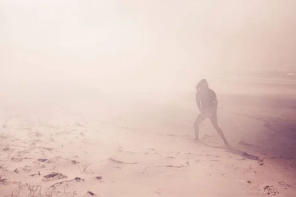 Australia bushfires. A person running from the fire. Dramatic image from massive fires in Australia