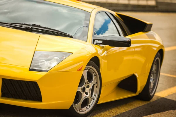 Front view of a yellow luxury sportcar — Stock Photo, Image